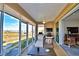 Relaxing screened lanai with lake and golf course view at 537 Pond Cypress Ct, Auburndale, FL 33823
