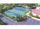 Community tennis and pickleball courts at 537 Pond Cypress Ct, Auburndale, FL 33823
