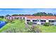 Aerial view of condo community near the lake at 608 Sweet Bay Cir, Winter Haven, FL 33884