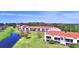 Aerial view of condo community by the lake at 608 Sweet Bay Cir, Winter Haven, FL 33884