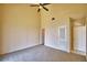 Spacious bedroom with a door to the bathroom and closet at 608 Sweet Bay Cir, Winter Haven, FL 33884