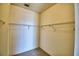 Walk-in closet offering ample storage with wire shelving at 608 Sweet Bay Cir, Winter Haven, FL 33884