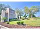 Welcoming community entrance with landscaping at 608 Sweet Bay Cir, Winter Haven, FL 33884