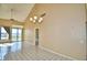 Bright dining room with tile floors and vaulted ceilings at 608 Sweet Bay Cir, Winter Haven, FL 33884