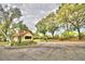 Gated entrance to community with guard house at 608 Sweet Bay Cir, Winter Haven, FL 33884