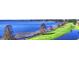 Scenic view of a lake with lush green landscape at 608 Sweet Bay Cir, Winter Haven, FL 33884