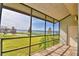 Spacious screened balcony overlooking lake at 608 Sweet Bay Cir, Winter Haven, FL 33884