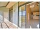 Balcony with sliding doors to living area and lake view at 608 Sweet Bay Cir, Winter Haven, FL 33884