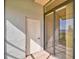 Balcony with sliding doors and lake view at 608 Sweet Bay Cir, Winter Haven, FL 33884