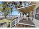 Covered back porch offers an awesome lake view at 922 S Lake Reedy Blvd, Frostproof, FL 33843