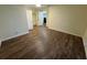 Comfortable bedroom boasts wood-look flooring and easy access to a spacious closet at 922 S Lake Reedy Blvd, Frostproof, FL 33843