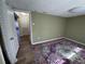 Spacious bedroom with wood-style flooring and view to the rest of the home at 922 S Lake Reedy Blvd, Frostproof, FL 33843