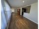 Sunlit living area featuring hardwood floors and large windows at 922 S Lake Reedy Blvd, Frostproof, FL 33843