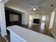 Open living space with hardwood floors and built-in entertainment center at 922 S Lake Reedy Blvd, Frostproof, FL 33843