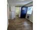 Room with wooden floors leading to the bathroom at 922 S Lake Reedy Blvd, Frostproof, FL 33843