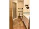 Bathroom with shower, toilet and updated vanity at 952 N Heron Cir, Winter Haven, FL 33884