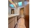 Bathroom with double vanity and skylights at 952 N Heron Cir, Winter Haven, FL 33884