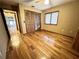Bright bedroom with hardwood floors and a large closet at 952 N Heron Cir, Winter Haven, FL 33884