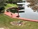 Private dock with multiple boat slips and a gazebo at 952 N Heron Cir, Winter Haven, FL 33884