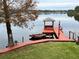 Private lakefront dock with gazebo and boat slip at 952 N Heron Cir, Winter Haven, FL 33884
