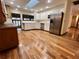 Spacious kitchen with stainless steel appliances and hardwood floors at 952 N Heron Cir, Winter Haven, FL 33884