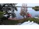Scenic lakefront property with dock and boathouse at 952 N Heron Cir, Winter Haven, FL 33884