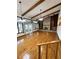 Living room features hardwood floors, a brick fireplace, and built-in shelves at 952 N Heron Cir, Winter Haven, FL 33884