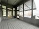 Spacious screened porch overlooking a pool and lake at 952 N Heron Cir, Winter Haven, FL 33884