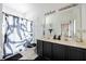 Bathroom with double vanity and shower/tub combo at 1005 Corvina Dr, Davenport, FL 33897