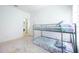 ' bedroom with bunk beds and access to laundry at 1005 Corvina Dr, Davenport, FL 33897
