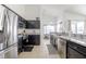 Modern kitchen with stainless steel appliances and marble counters at 1005 Corvina Dr, Davenport, FL 33897