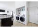 Convenient laundry room with washer and dryer at 1005 Corvina Dr, Davenport, FL 33897