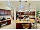 Modern kitchen with granite countertops, stainless steel appliances, and a large island at 1006 W Lake Hamilton Dr, Winter Haven, FL 33881
