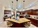 Well-equipped kitchen boasts a large center island and stainless steel appliances at 1006 W Lake Hamilton Dr, Winter Haven, FL 33881