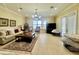Spacious living room with large window and a view to the exterior, neutral color palette at 1006 W Lake Hamilton Dr, Winter Haven, FL 33881