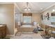 Luxurious bathroom featuring a soaking tub, separate shower, and elegant chandelier at 1027 Bradbury Rd, Winter Haven, FL 33880