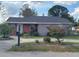 Charming single-story home with a well-maintained lawn and circular driveway at 108 Prospect Ave, Winter Haven, FL 33880