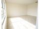 Bright, airy room featuring tile floors and large windows at 110 Lake Mattie Rd, Auburndale, FL 33823