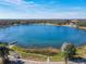 Aerial view of property showcasing lake and surroundings at 1107 Saint Anne Shrine Rd, Lake Wales, FL 33898