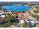 Aerial view showing home's lot size and lakefront location at 1107 Saint Anne Shrine Rd, Lake Wales, FL 33898