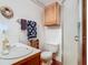 Bathroom with a sink, decorative elements and shower at 1107 Saint Anne Shrine Rd, Lake Wales, FL 33898