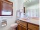 Bathroom showcasing a unique sink and vintage fixtures under a window with natural light at 1107 Saint Anne Shrine Rd, Lake Wales, FL 33898