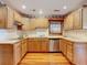 Well-equipped kitchen with stainless steel appliances and ample counter space, perfect for meal preparation and enjoyment at 1107 Saint Anne Shrine Rd, Lake Wales, FL 33898