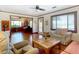 Bright and airy living room with hardwood floors and natural light at 1107 Saint Anne Shrine Rd, Lake Wales, FL 33898