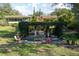 Aerial view of backyard featuring a pergola sitting area, perfect for outdoor relaxation at 1121 Sunset Dr, Lake Wales, FL 33853