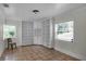 Bedroom with tile flooring and built in bookshelves with window for natural light at 1121 Sunset Dr, Lake Wales, FL 33853