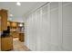 Ample kitchen storage with floor-to-ceiling pantry and shaker cabinets, maximizing space and organization at 1121 Sunset Dr, Lake Wales, FL 33853