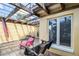 Charming patio featuring a wooden swing at 1121 Sunset Dr, Lake Wales, FL 33853