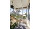 Stairs leading to a porch with lake views at 1121 Sunset Dr, Lake Wales, FL 33853