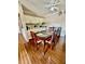 Traditional dining room featuring a glass-topped table, ornate wood chairs, and neutral walls at 1330 Skyview Blvd, Lakeland, FL 33801